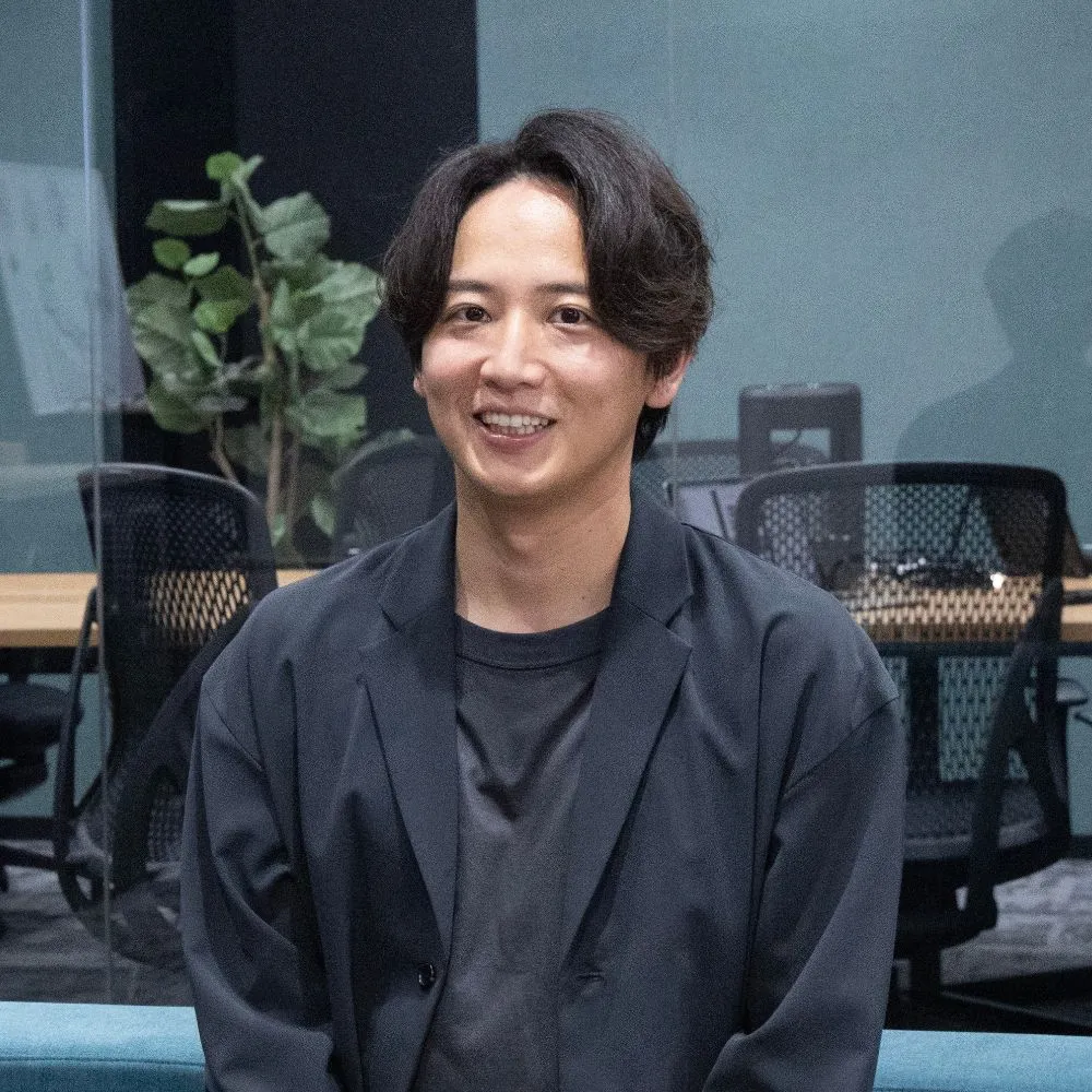 安達 昭典