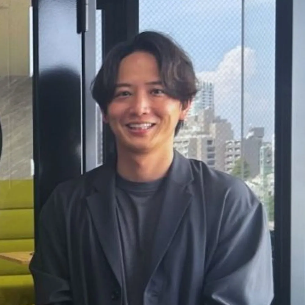 安達 昭典